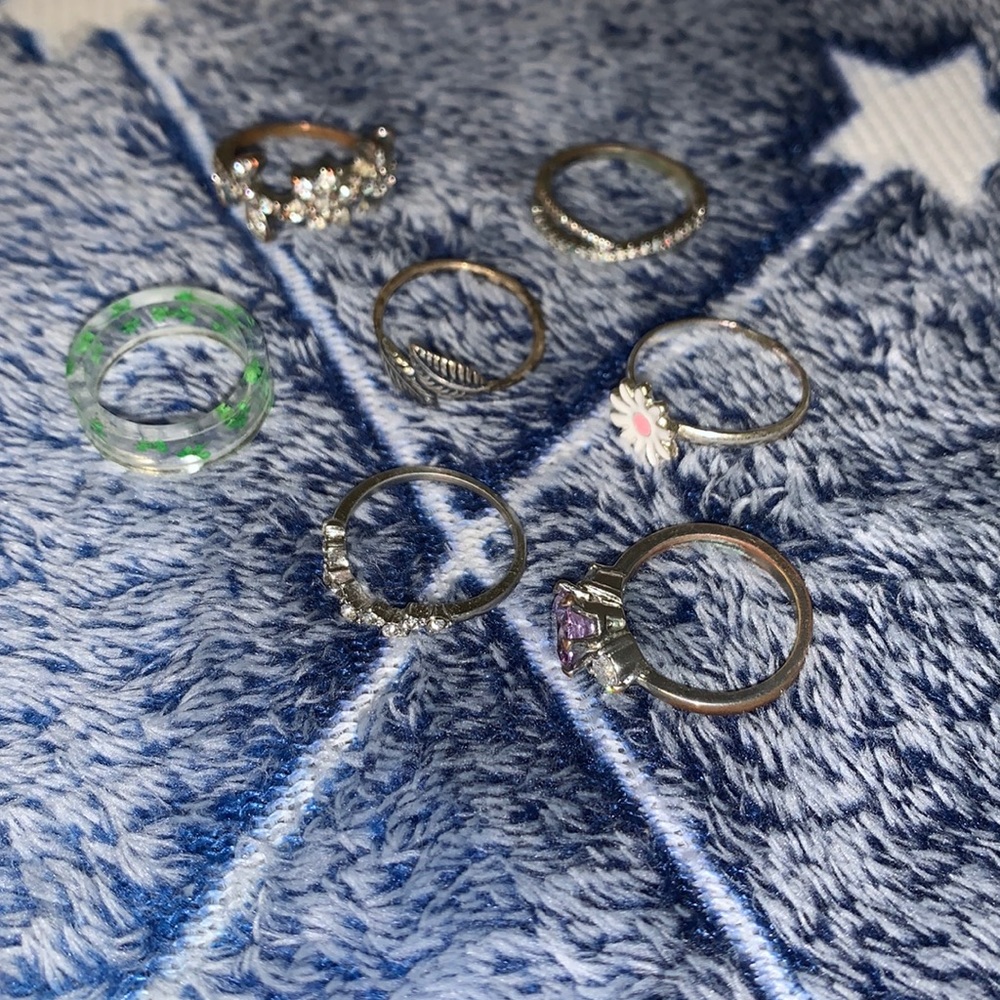7 Assorted Silver/Clear Rings